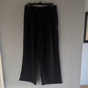 Fabletics Year Round Terry Wide Leg Pants in Black. Size Large, Short length.